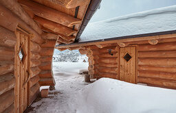 Blockhäuser im Winter